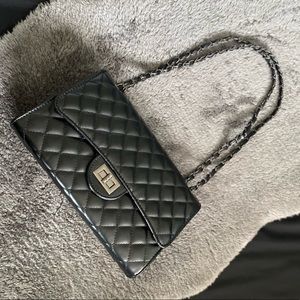 Black quilted purse